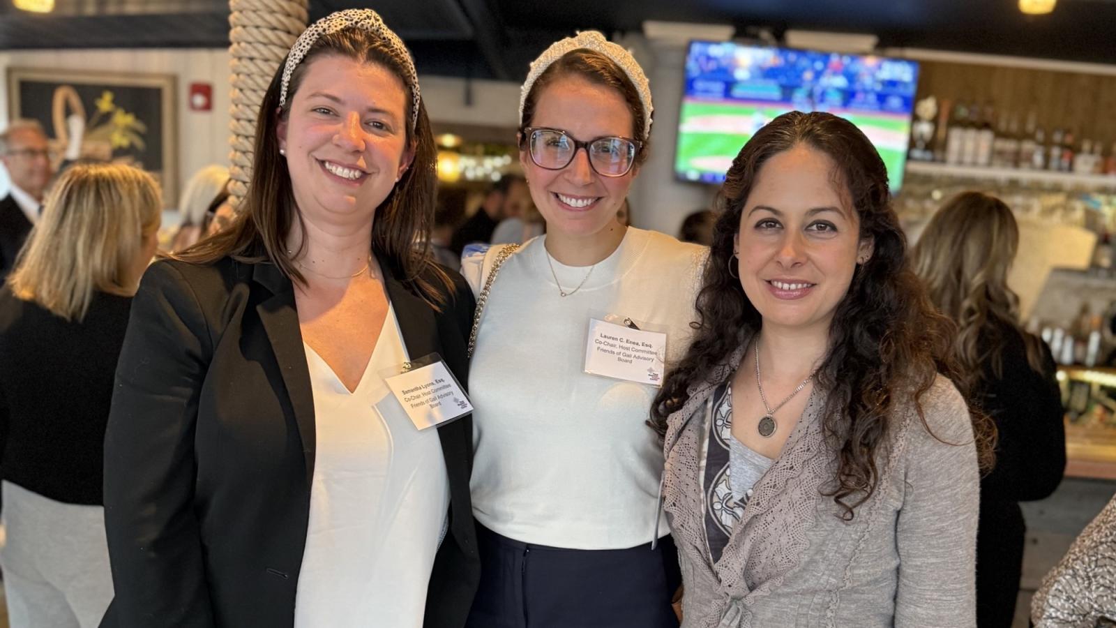 Elisabeth Haub School of Law at Pace University Samantha Lyons, Esq., Lauren C. Enea, Esq., and Stella King, Esq. at PWJC event