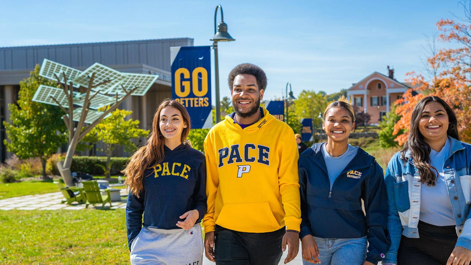 Pace University students walking on the Pleasantville campus.