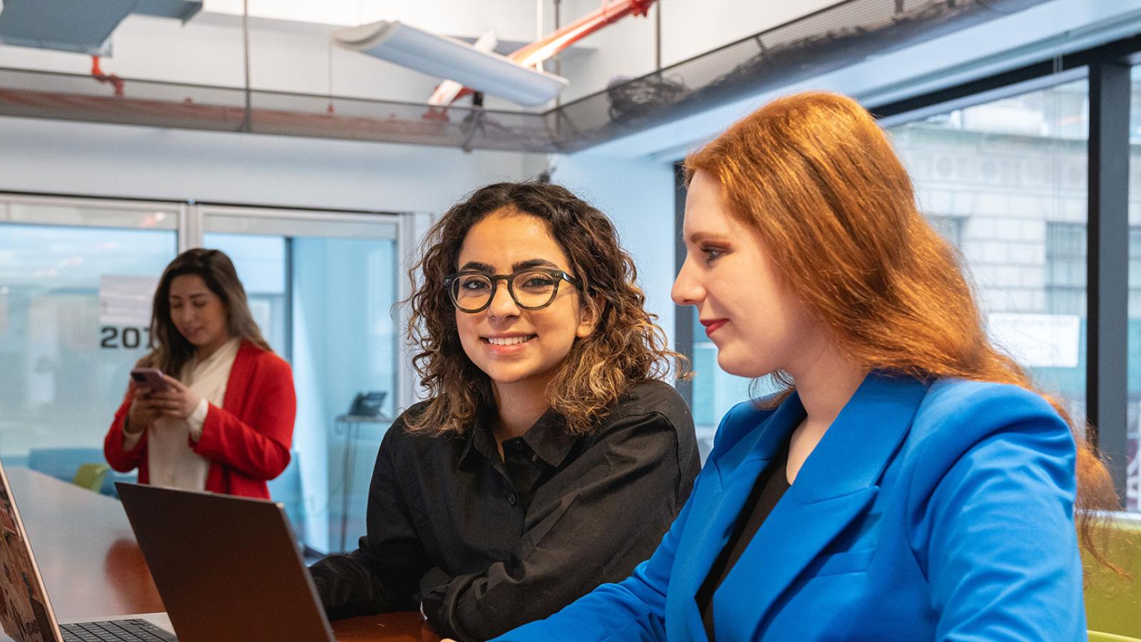 Pace University alum mentoring a Pace University student.