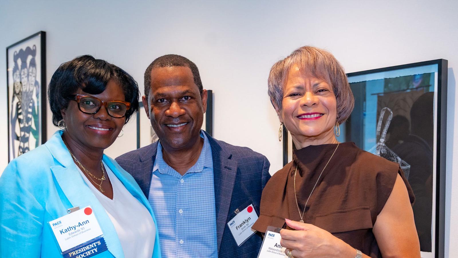 Pace University alumni smiling at the camera at the 2025 Reunion.