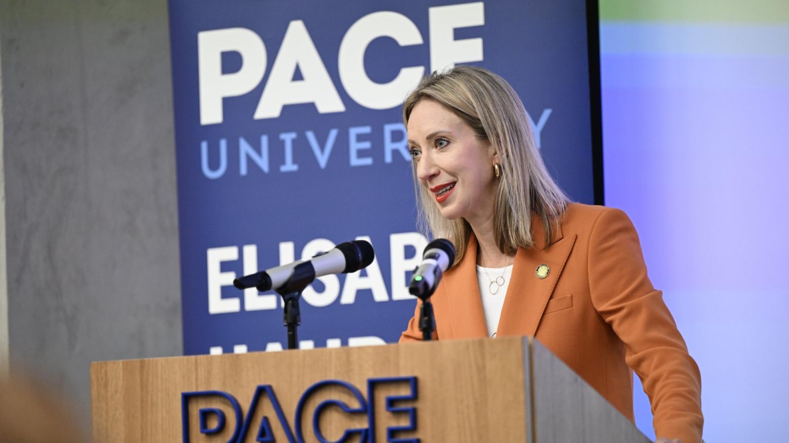 Elisabeth Haub School of Law at Pace University Tucker Prize awardee Lucy Lang speaking at podium