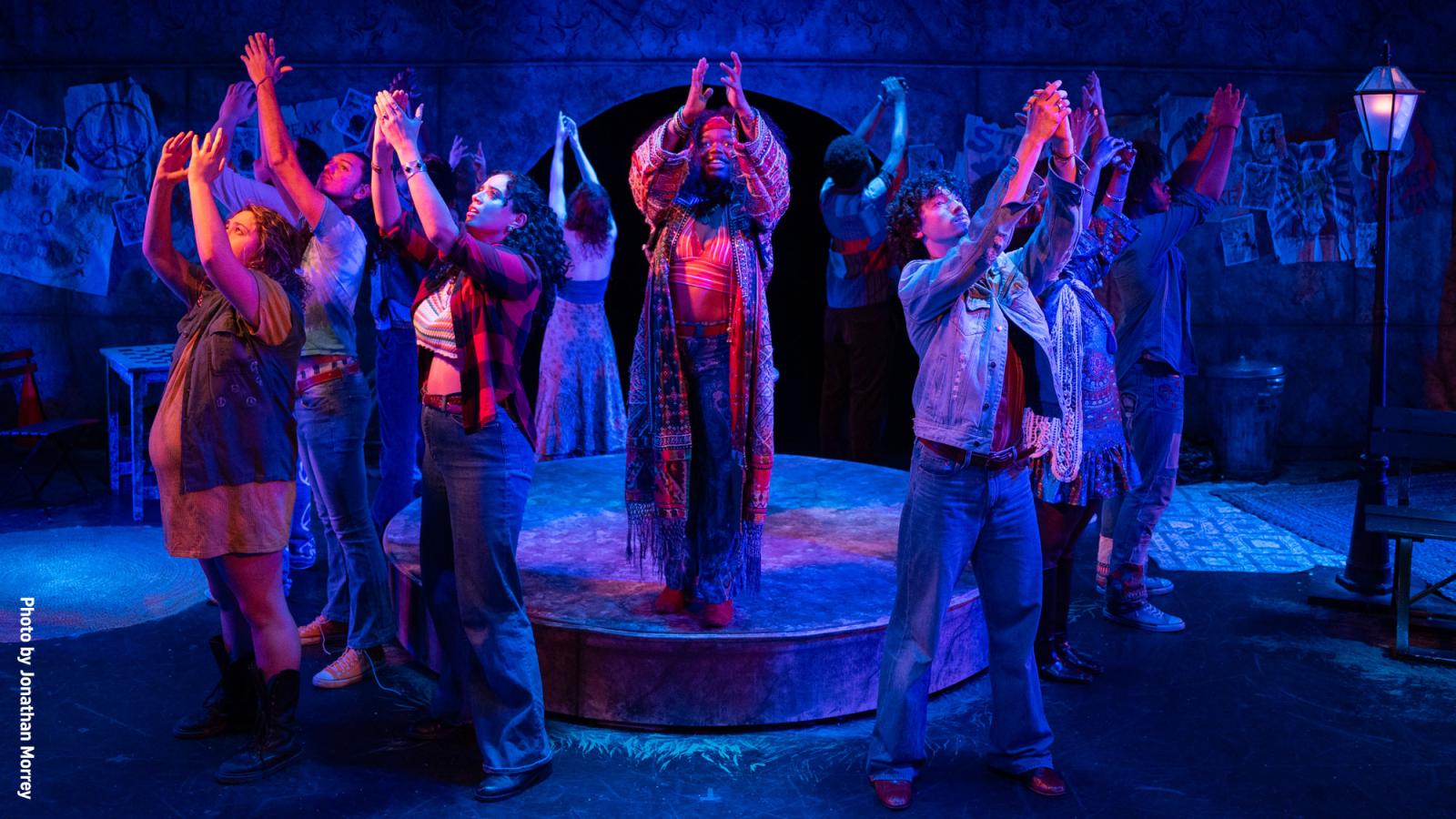 Pace University Sands College of Performing Arts students on stage during a performance of Hair.
