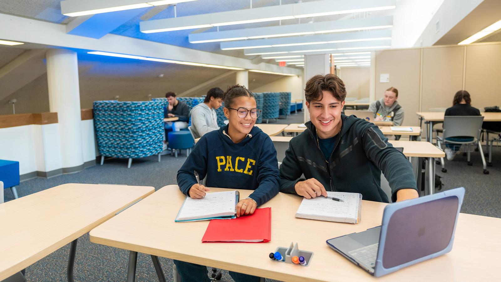 Two Pace University students study together