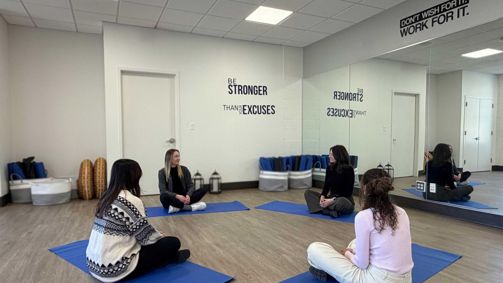 Elisabeth Haub School of Law at Pace University students and professor participating in yoga