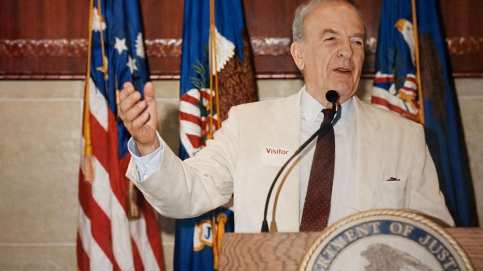 Dean Emeritus Richard Ottinger speaking at Department of Justice