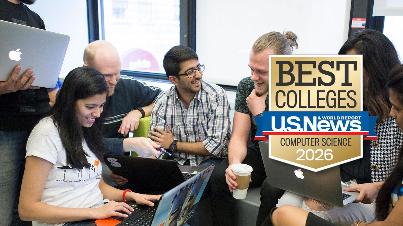 Group of Pace University students studying and looking at their laptops.