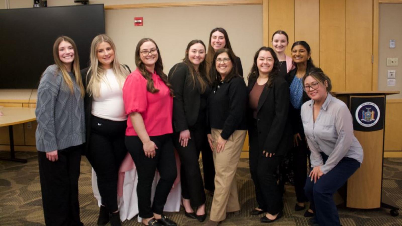 Elisabeth Haub School of Law at Pace University 2026 WALS Pioneer of Justice Award group photo with honoree Cindy Kanusher