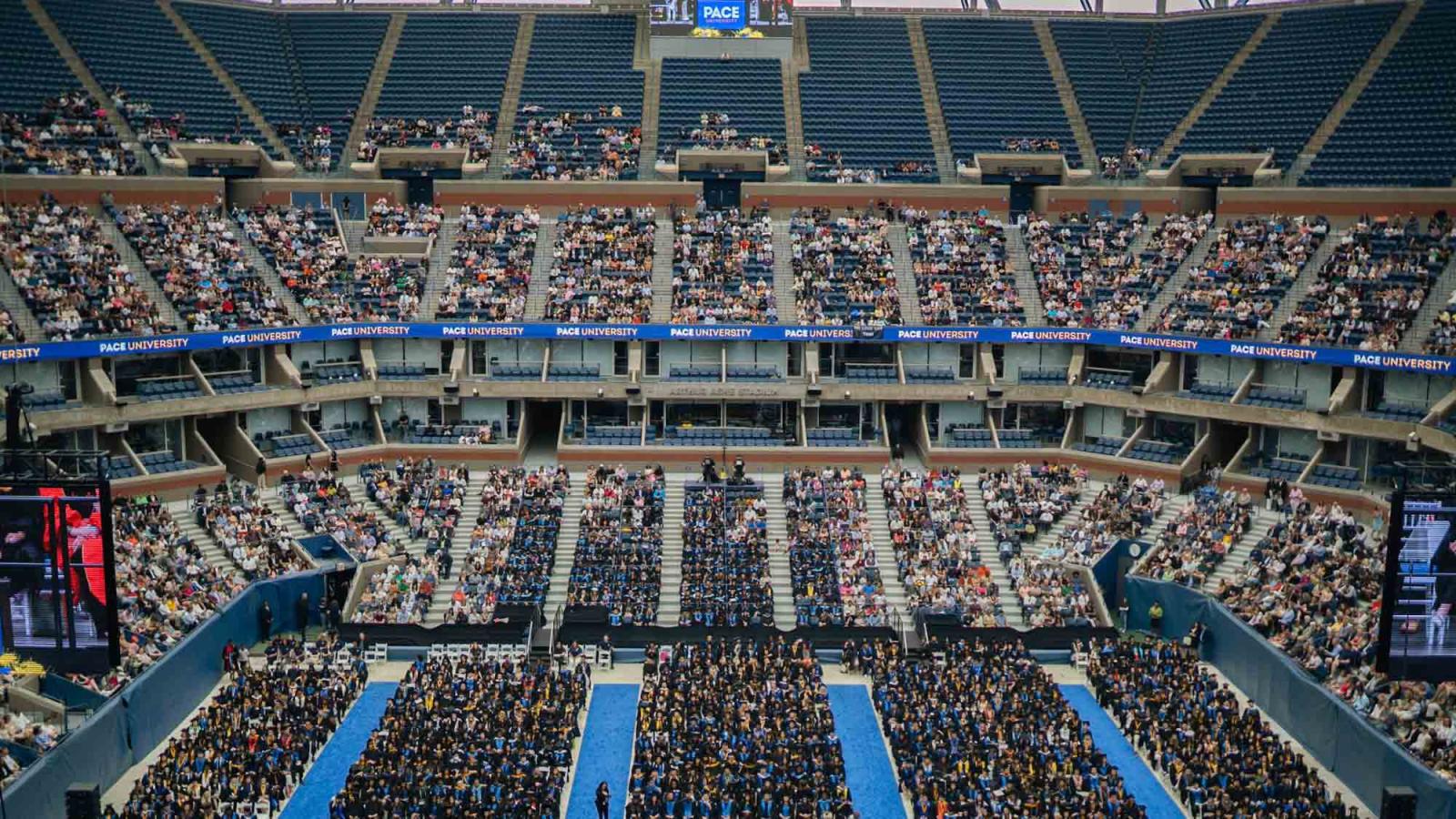 Overhead look at the crowd inside the stadium at Commencement.