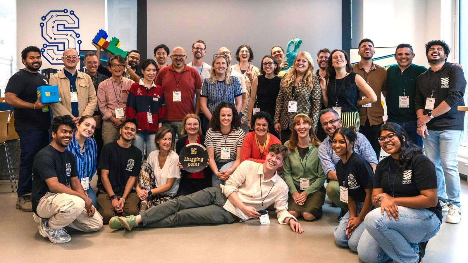 Pace University students posing for the camera at the Global Innovation Summit for Design-Led Education and Real-World Problem Solving