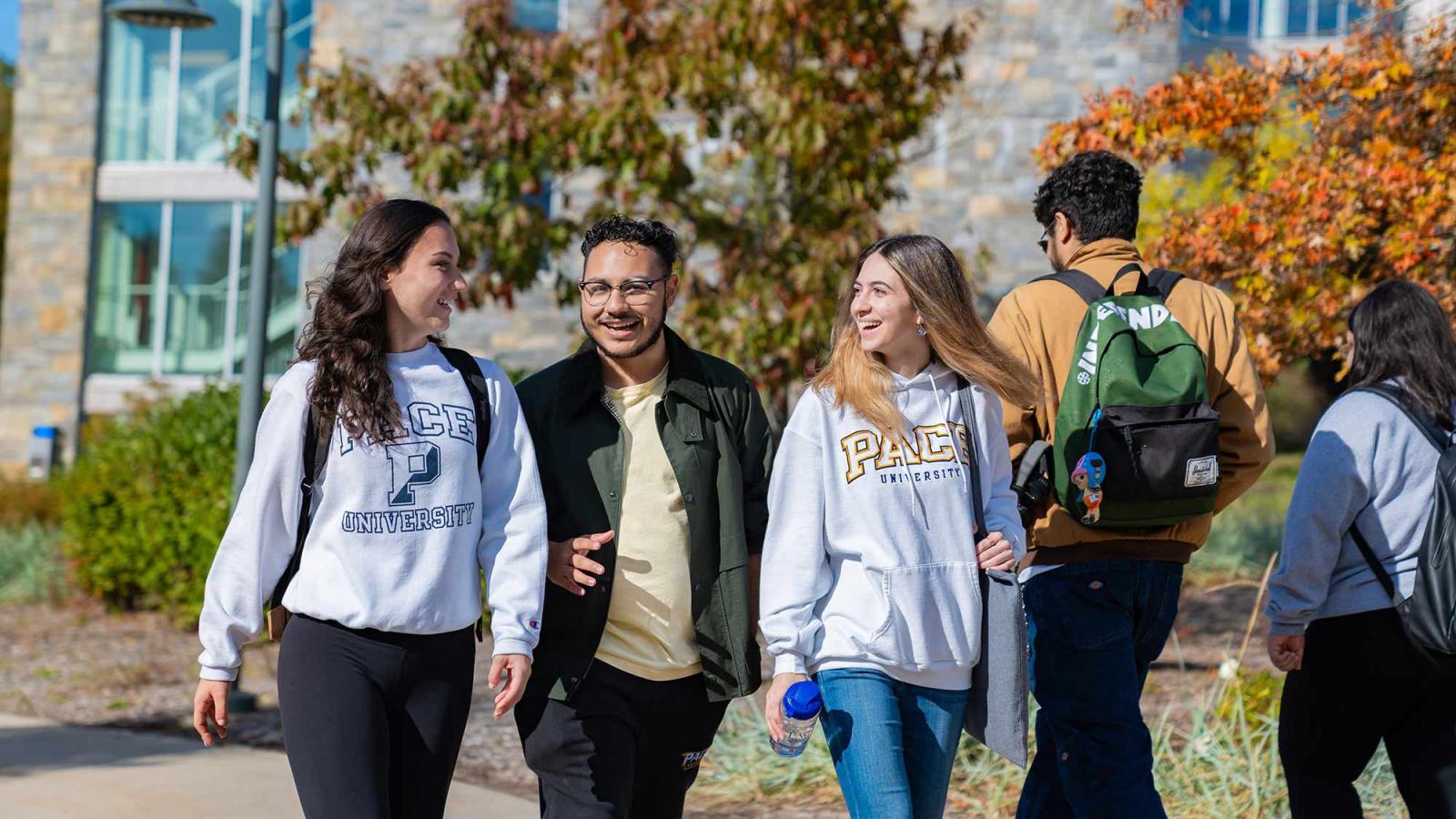 Pace University students walking on the Pleasantville campus.