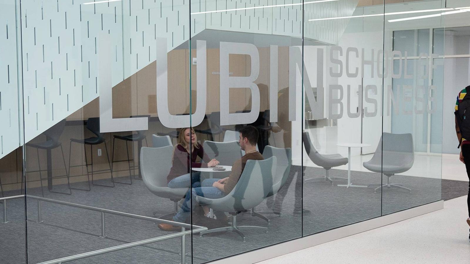 Lubin students sitting in a study lounge at One Pace Plaza