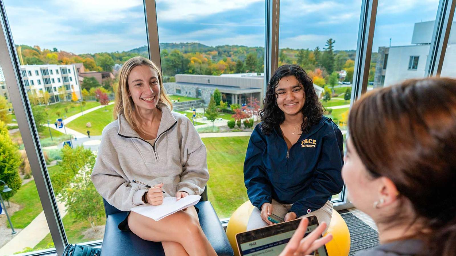 Group of Pace University socializing on the Westchester campus.