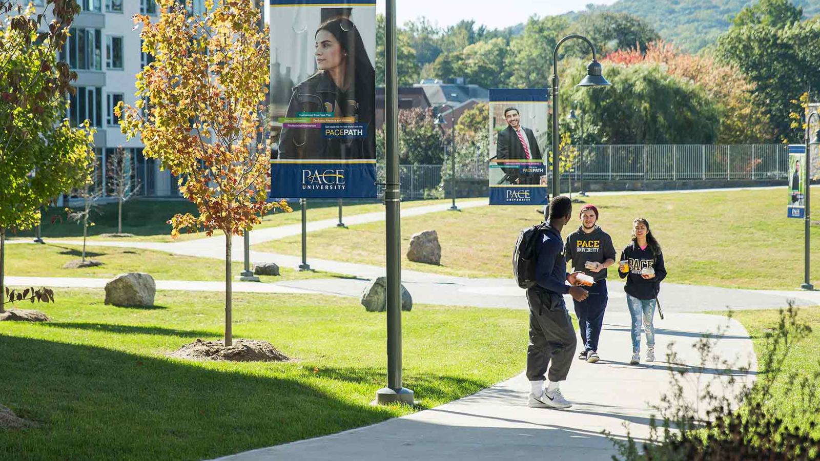 Pace University students walking on the Pleasantville campus.