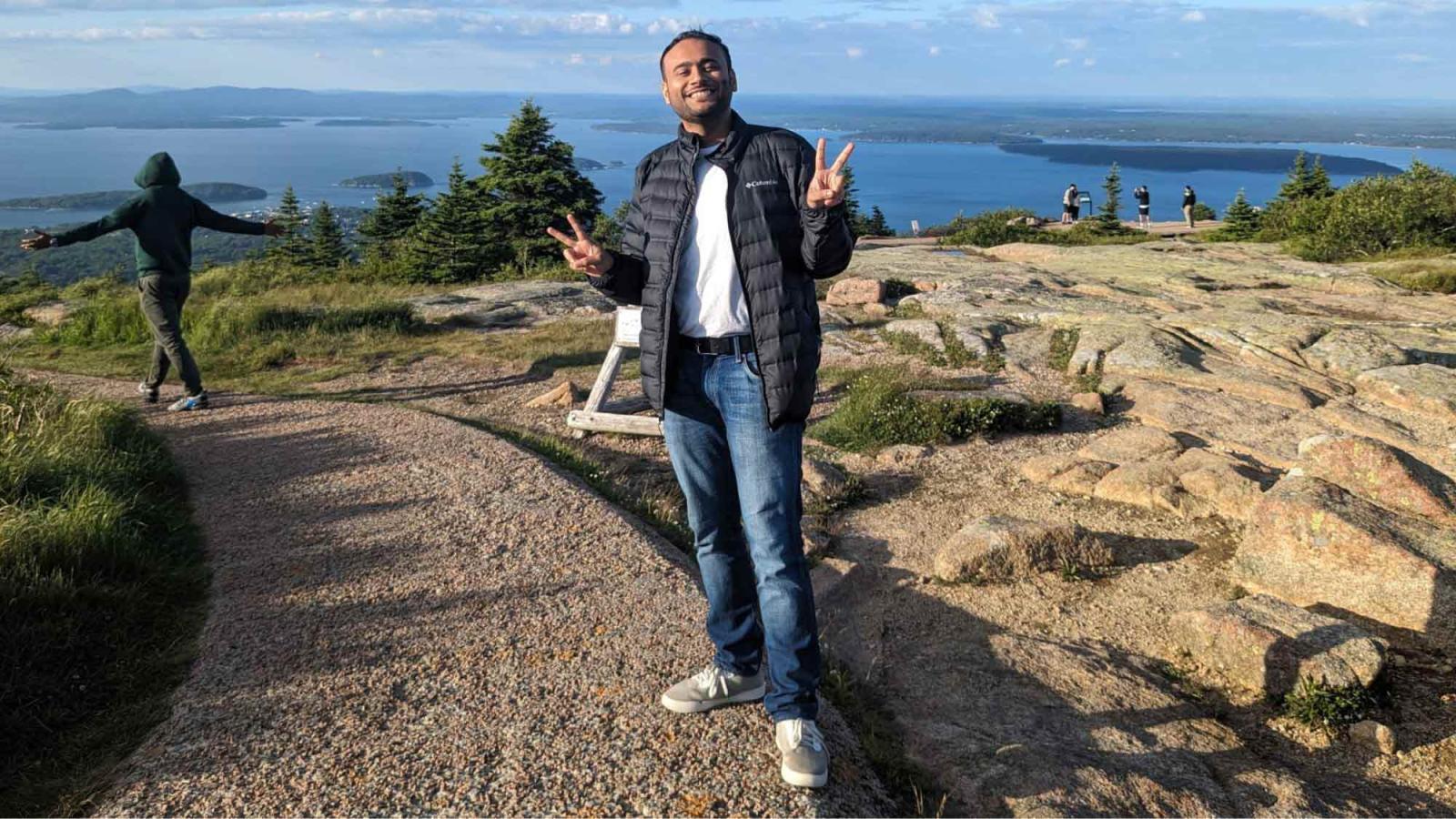 Akshay Nair, student at Pace University's Seidenberg School of CSIS posing for a photo in nature.