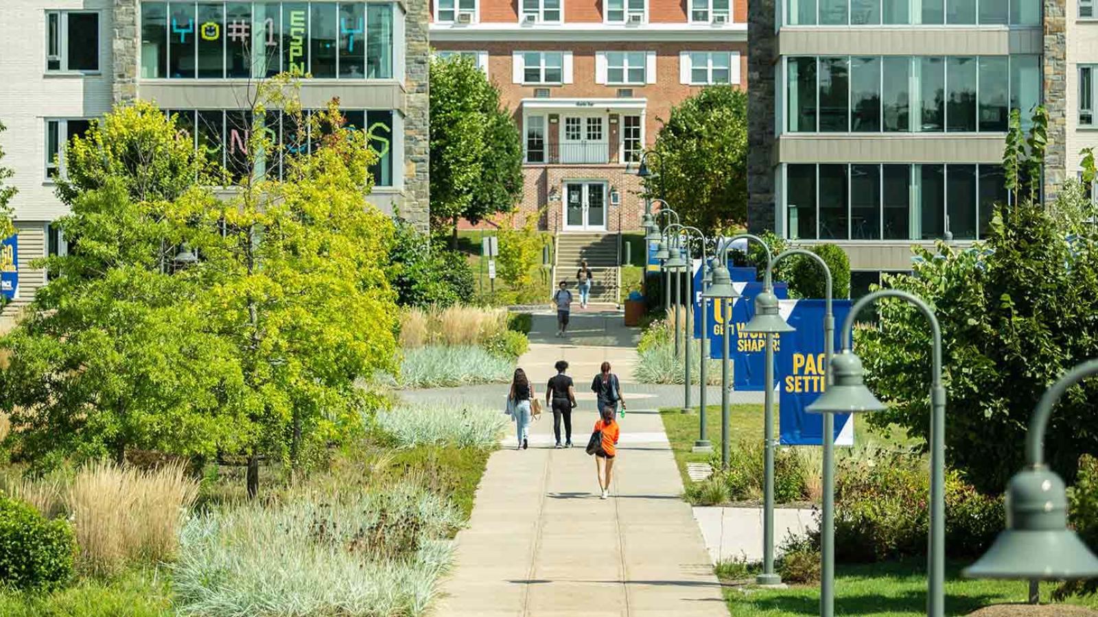 Image of students walking on the Pace University Westchester campus.