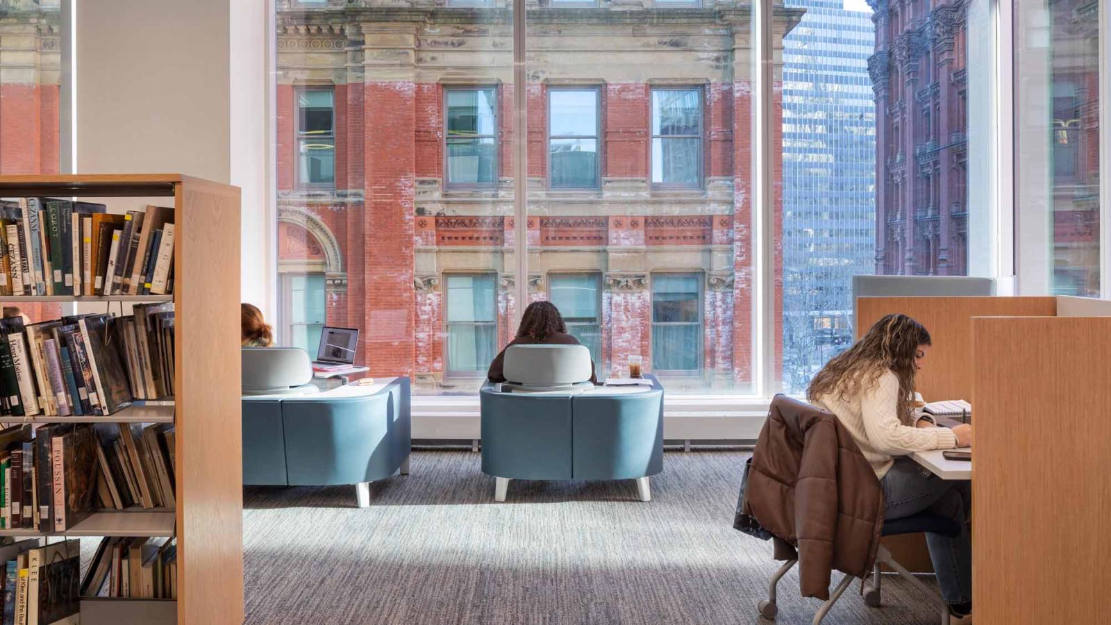 Students working in Pace University's Beekman Library.