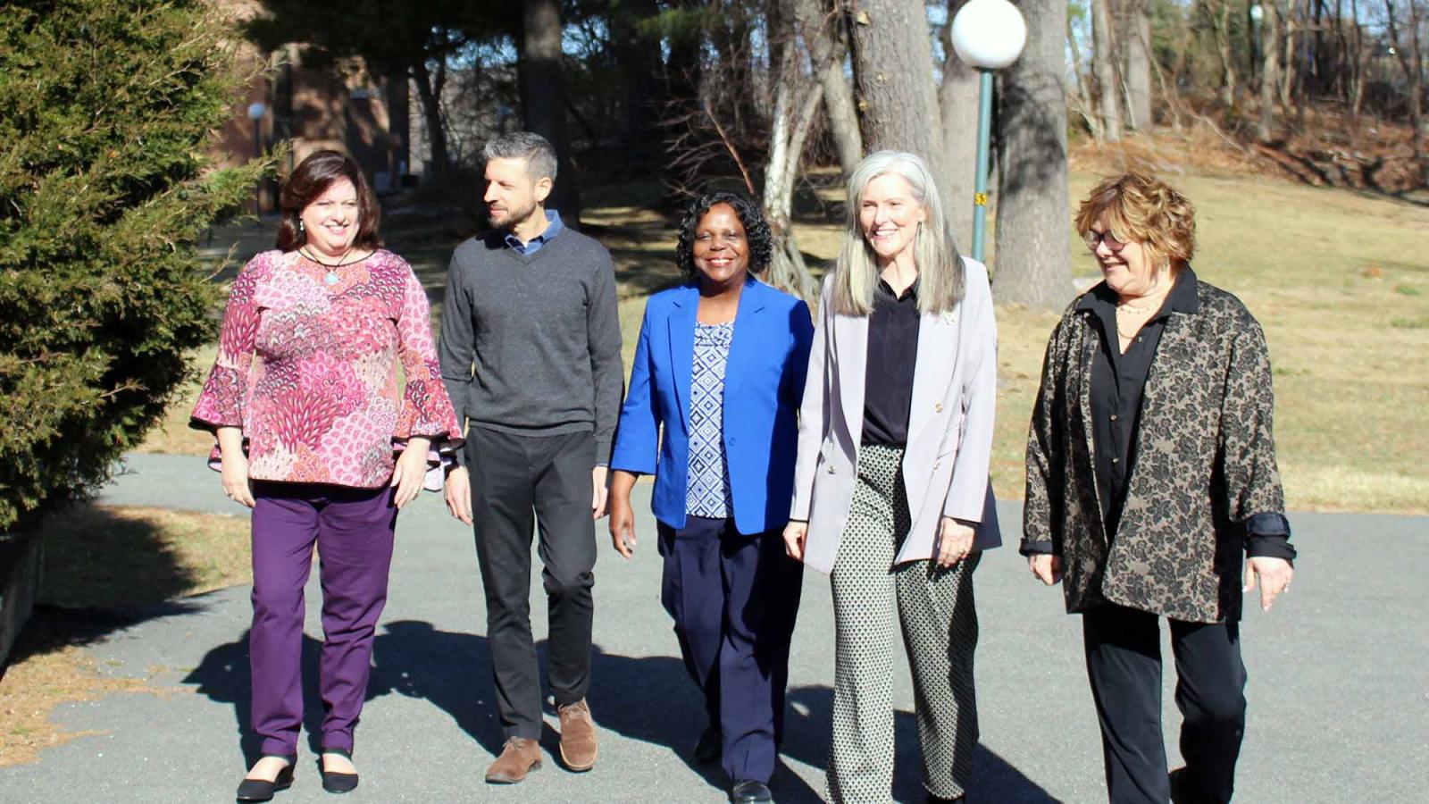 various professors from Pace University's College of Health Profession walking together on the Pleasantville campus