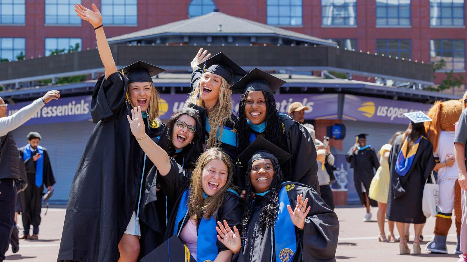 Pace University students celebrating their Commencement.