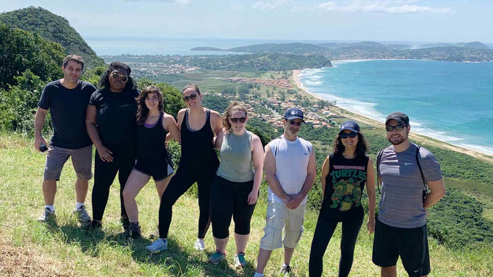 Elisabeth Haub School of Law students on a hill overlooking the water