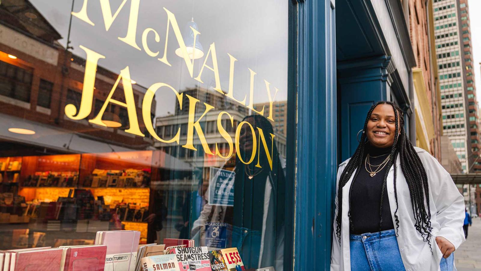 Pace University Publishing student standing outside the McNally Jackson bookstore