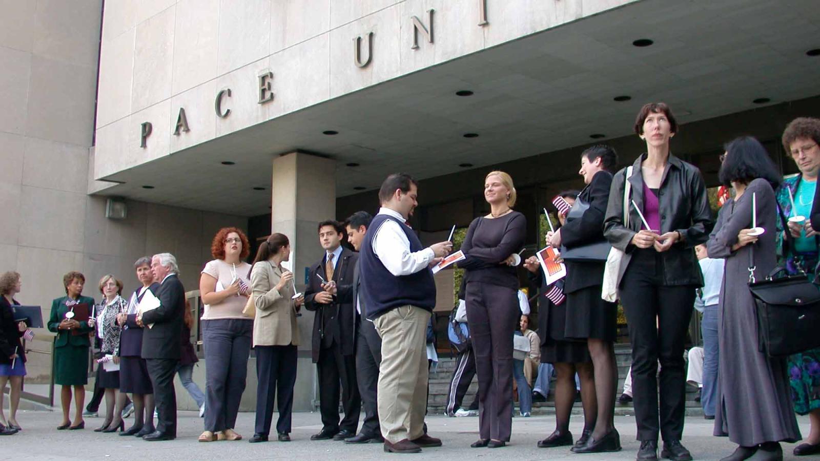 Vigil in front of One Pace Plaza in 2001.