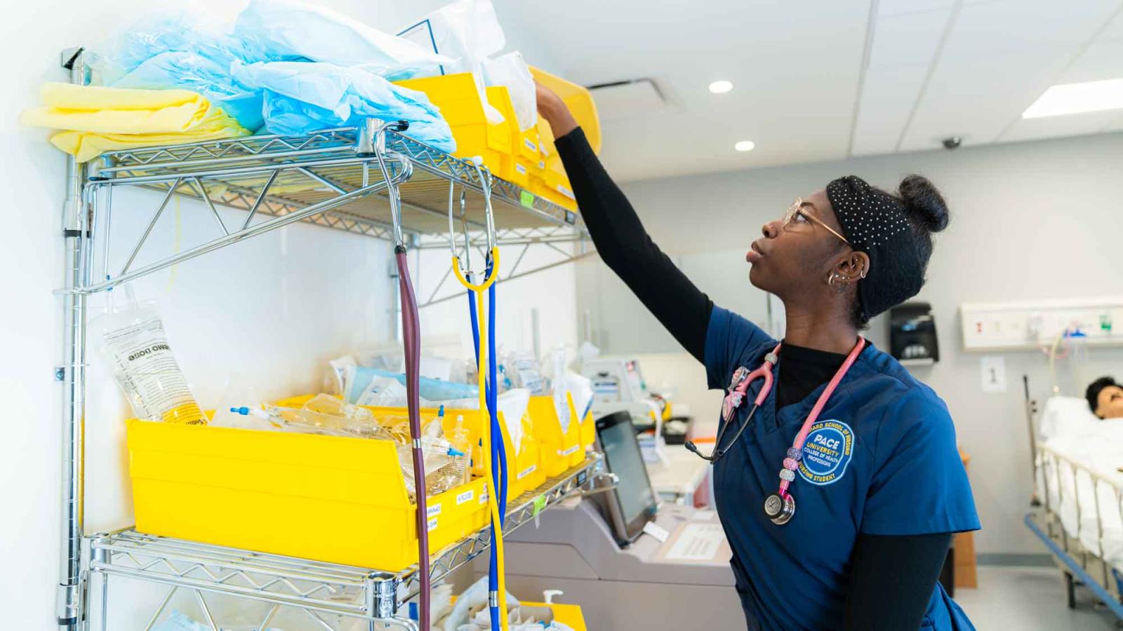 Pace University nursing student in simulation lab.