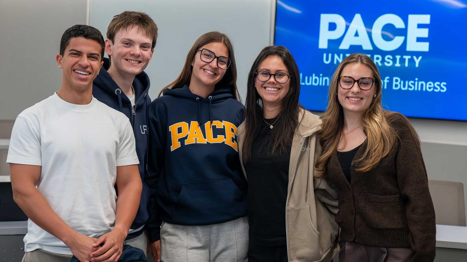 Group of Pace University Lubin School of Business students standing together