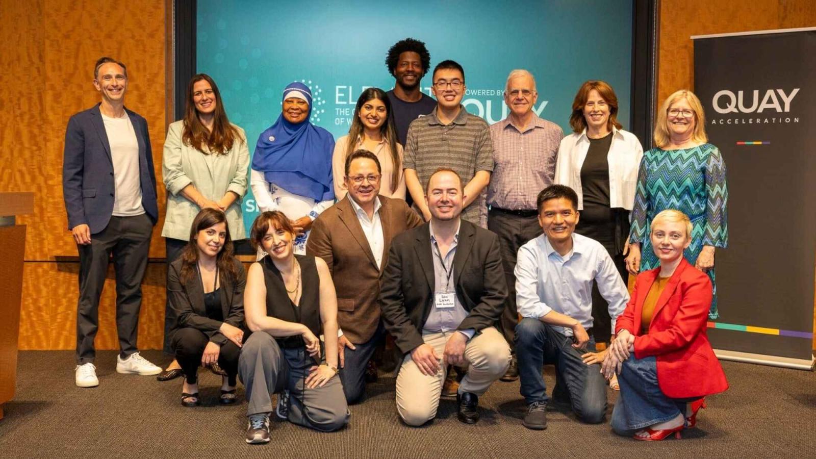 Averent team on stage at a tech accelerator event