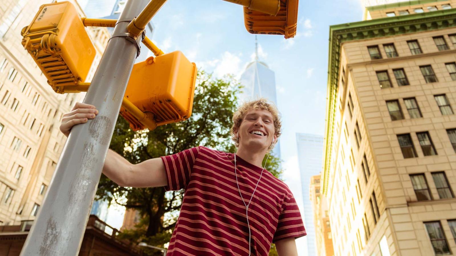 Pace University student in NYC smiling at the camera.