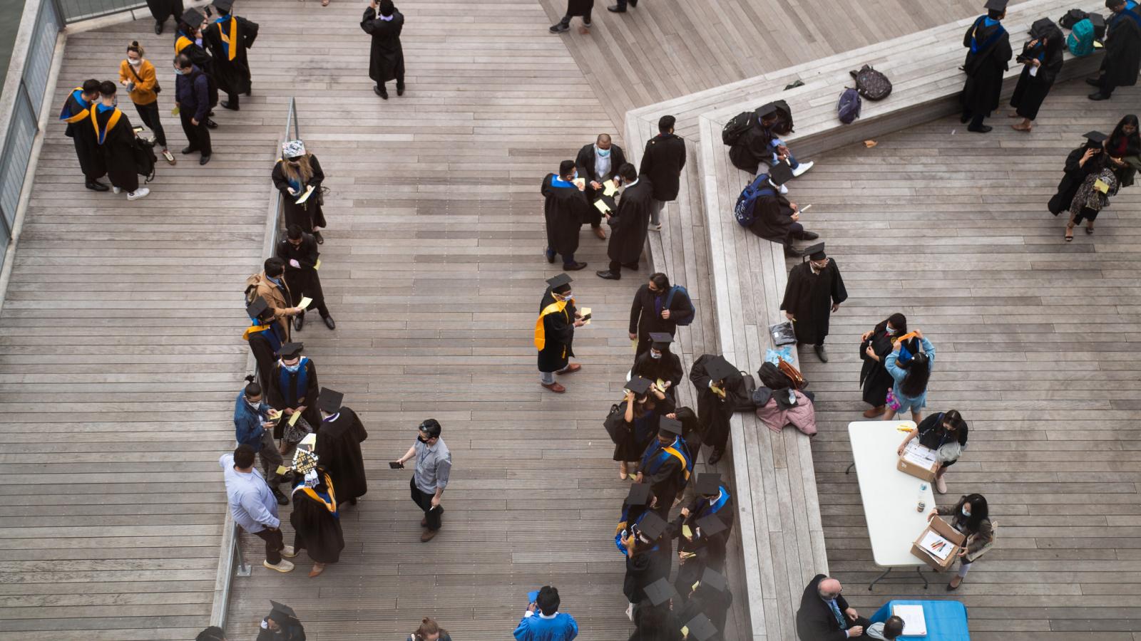 overhead shot of people on a pier