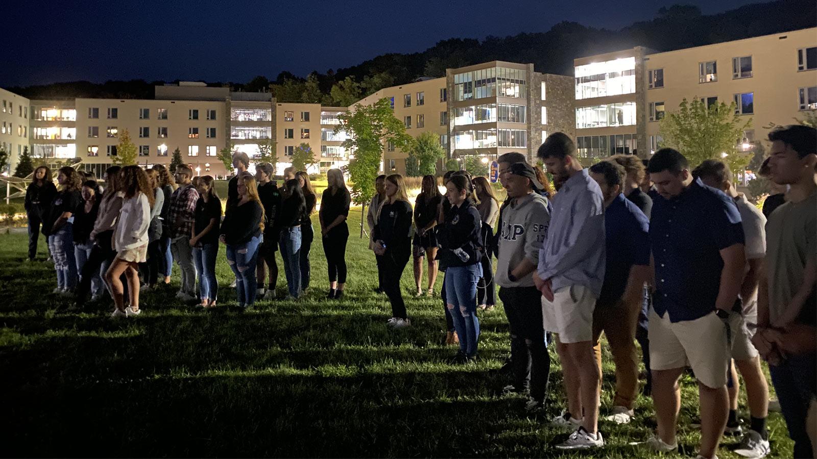 group of students in the dark