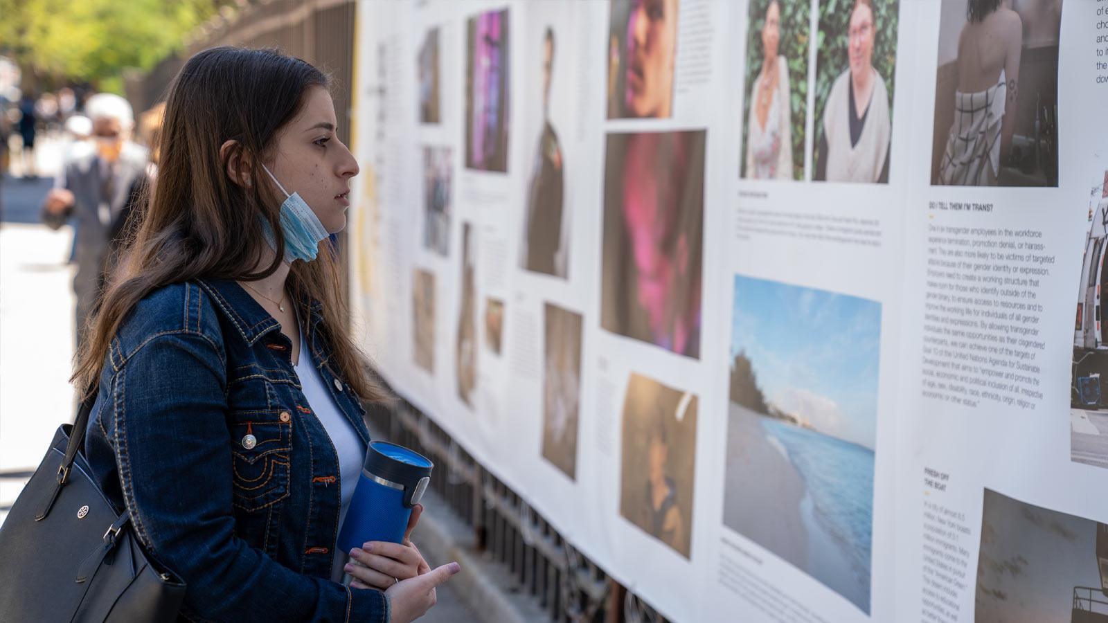 young woman looking at an art exhibition