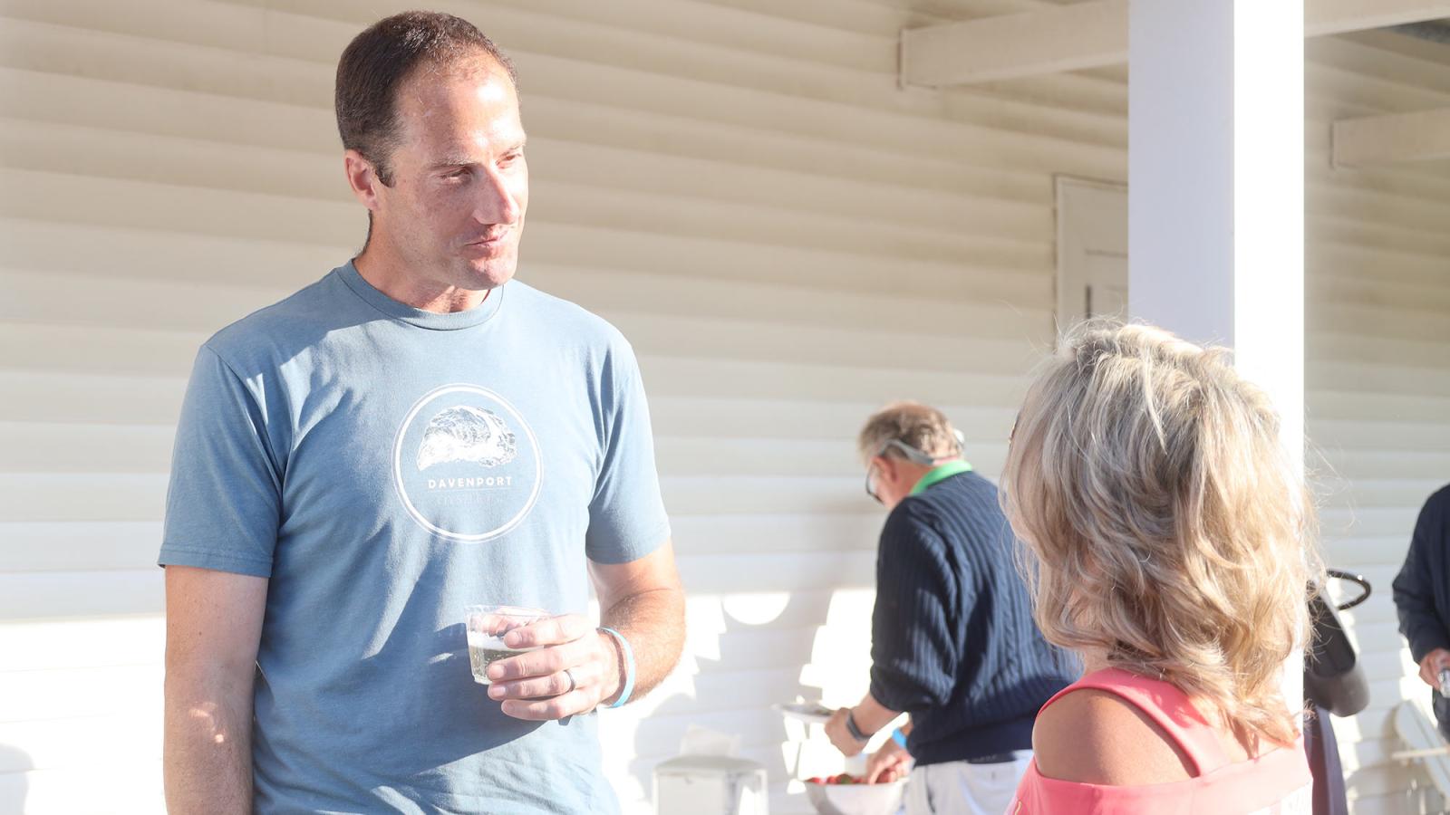 Professor Maria Luskay (right) speaks with Jamie Davenport, owner of Davenport Oyster Company in Dennis, MA.