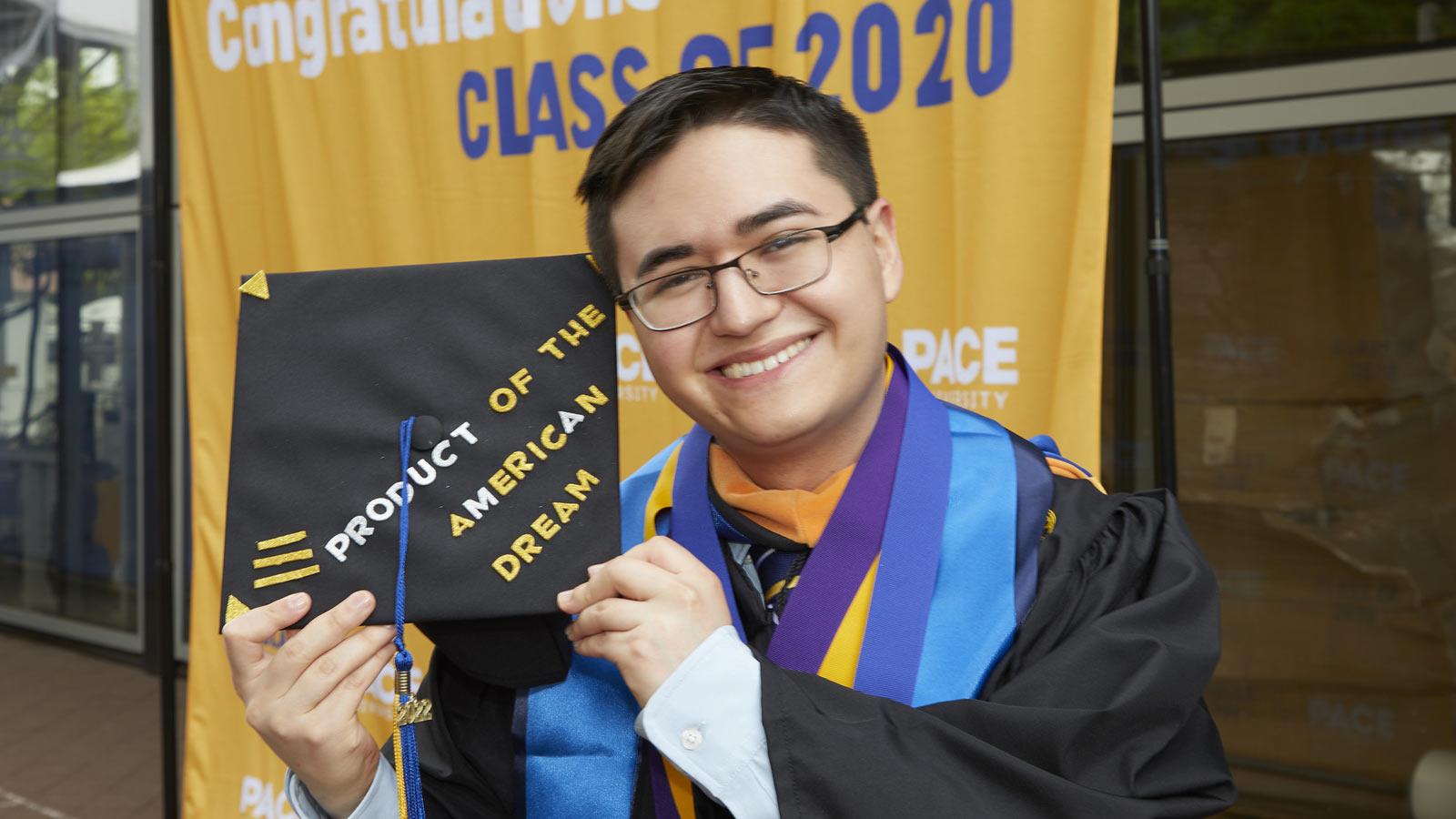 person holding a graduation cap