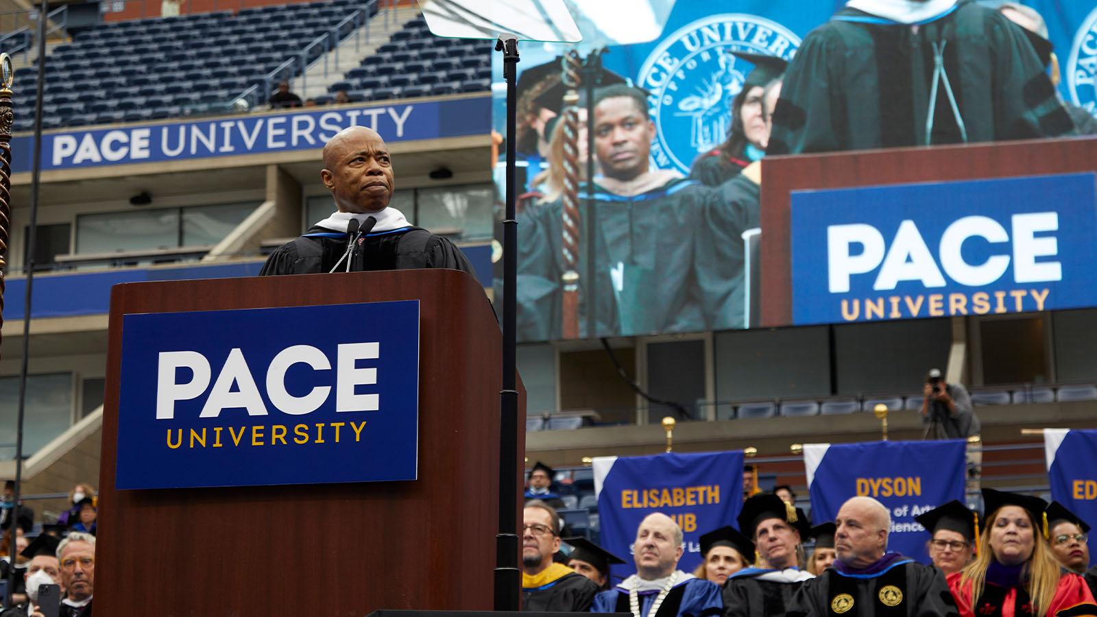 New York City Mayor Eric Adams addresses graduates before receiving an honorary doctorate. 