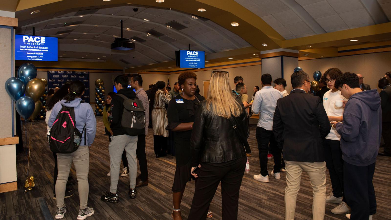 Pace Entrepreneurship Studio launch attendees mingling in the Bianco Room