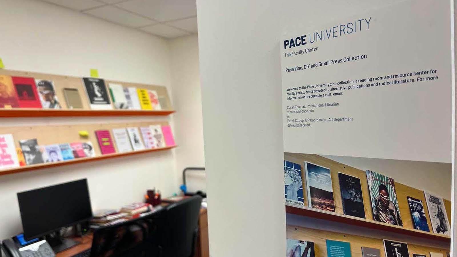 A view of Pace's zine library, with a welcome placard 