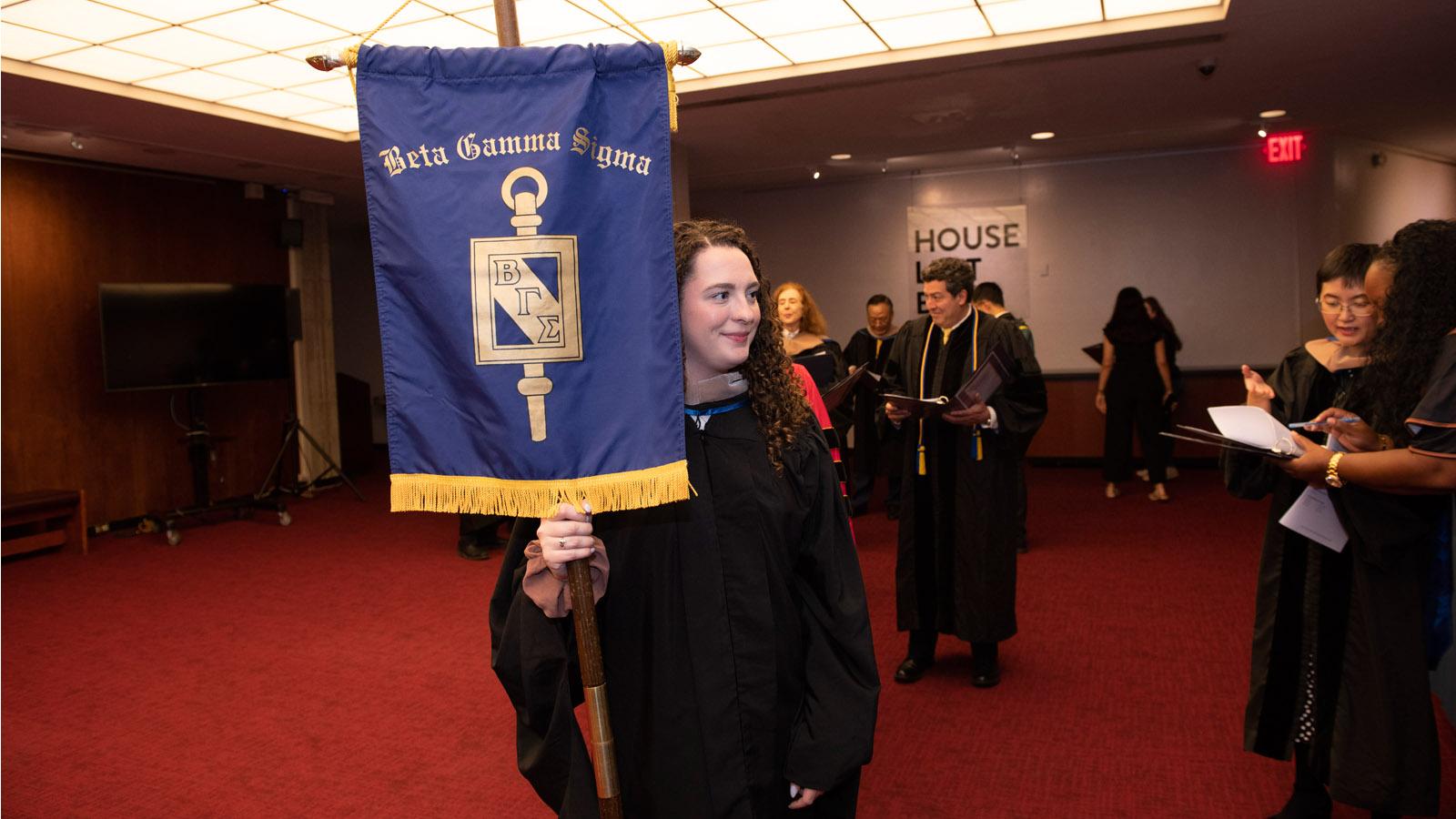 New York City deans, faculty, and staff lining up for the procession to open the 2023 New York City Lubin Awards Ceremony