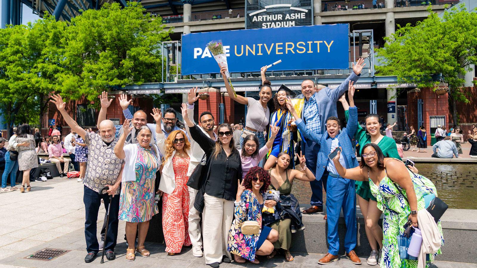 pace grad and family posing for the camera