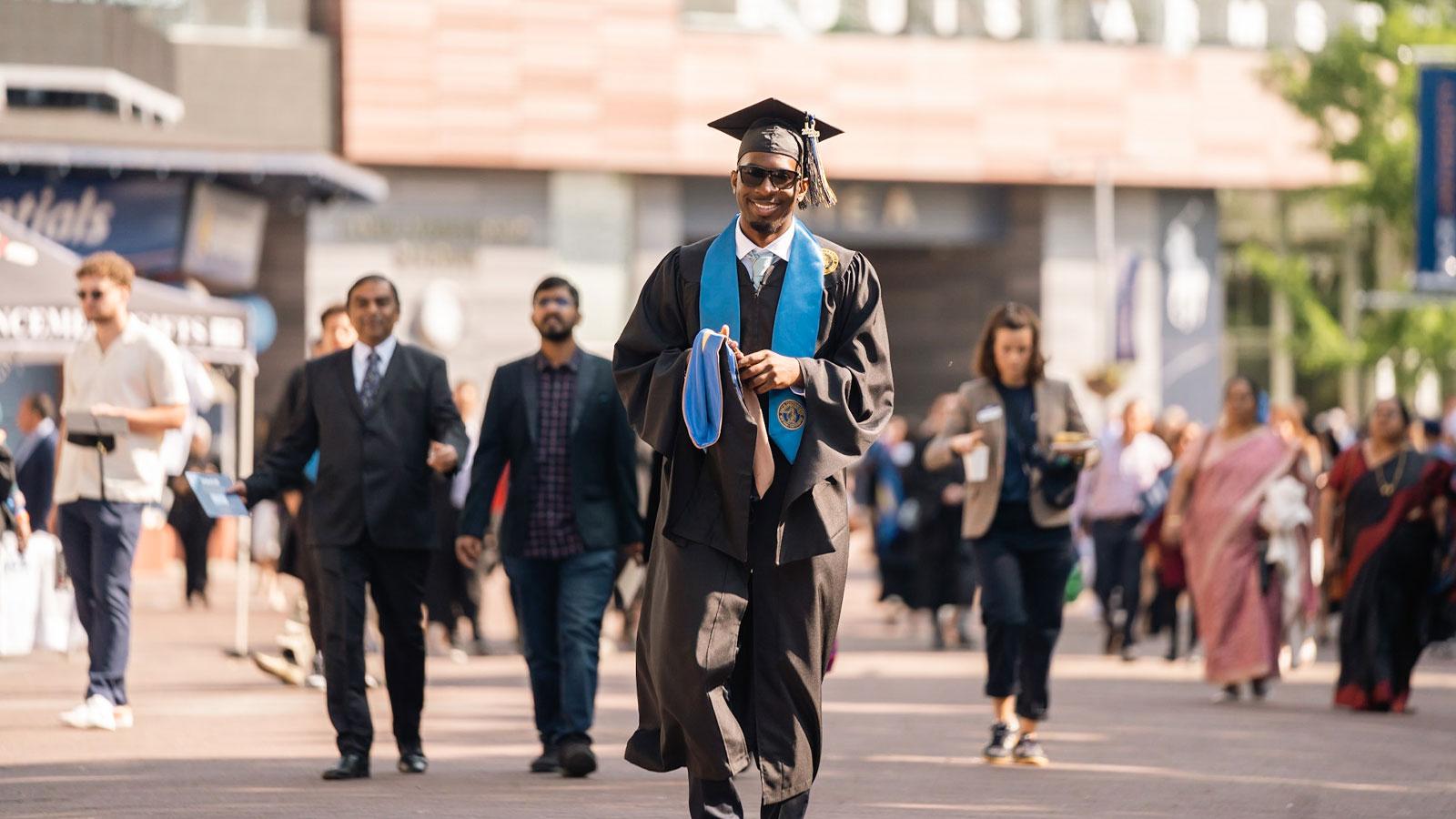 pace graduate posing for the camera