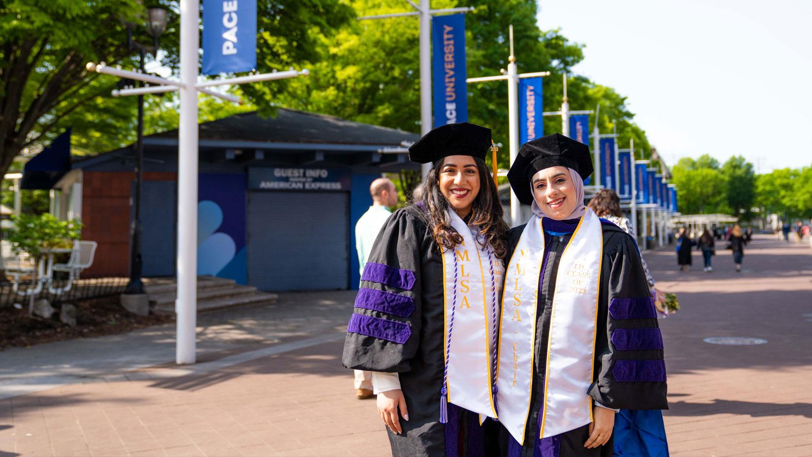 haub law graduates posing for the camera