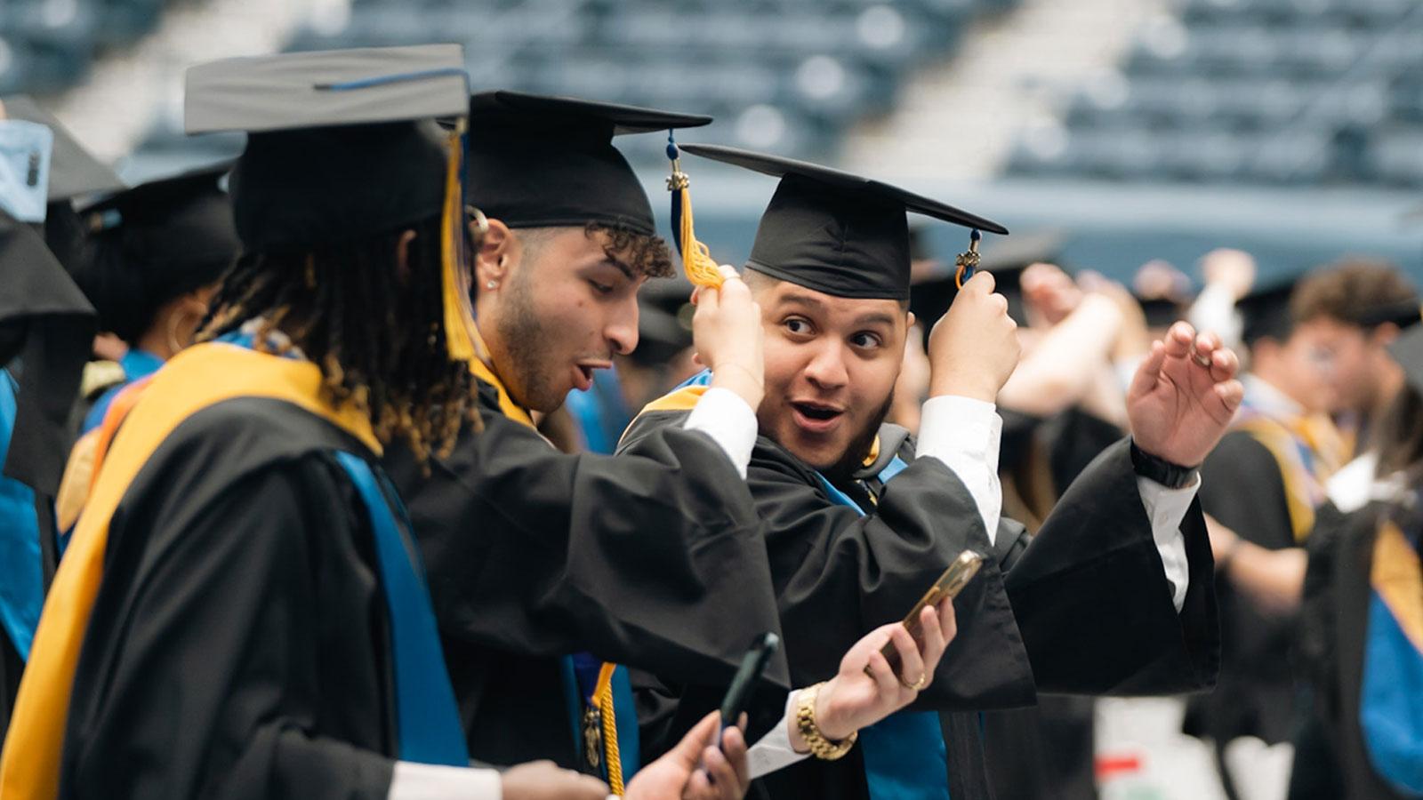 graduates turning their tassels.