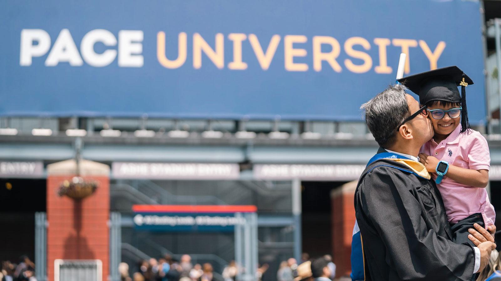 pace graduates posing for the camera