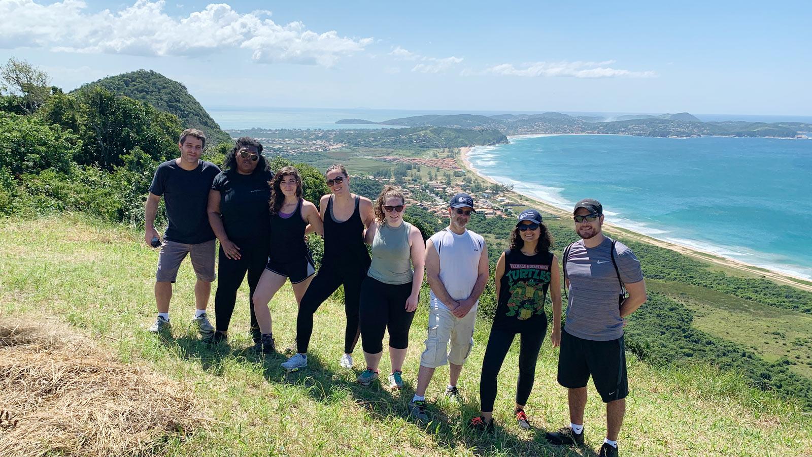 Elisabeth Haub School of Law students on a hilltop near the Brazilian coast