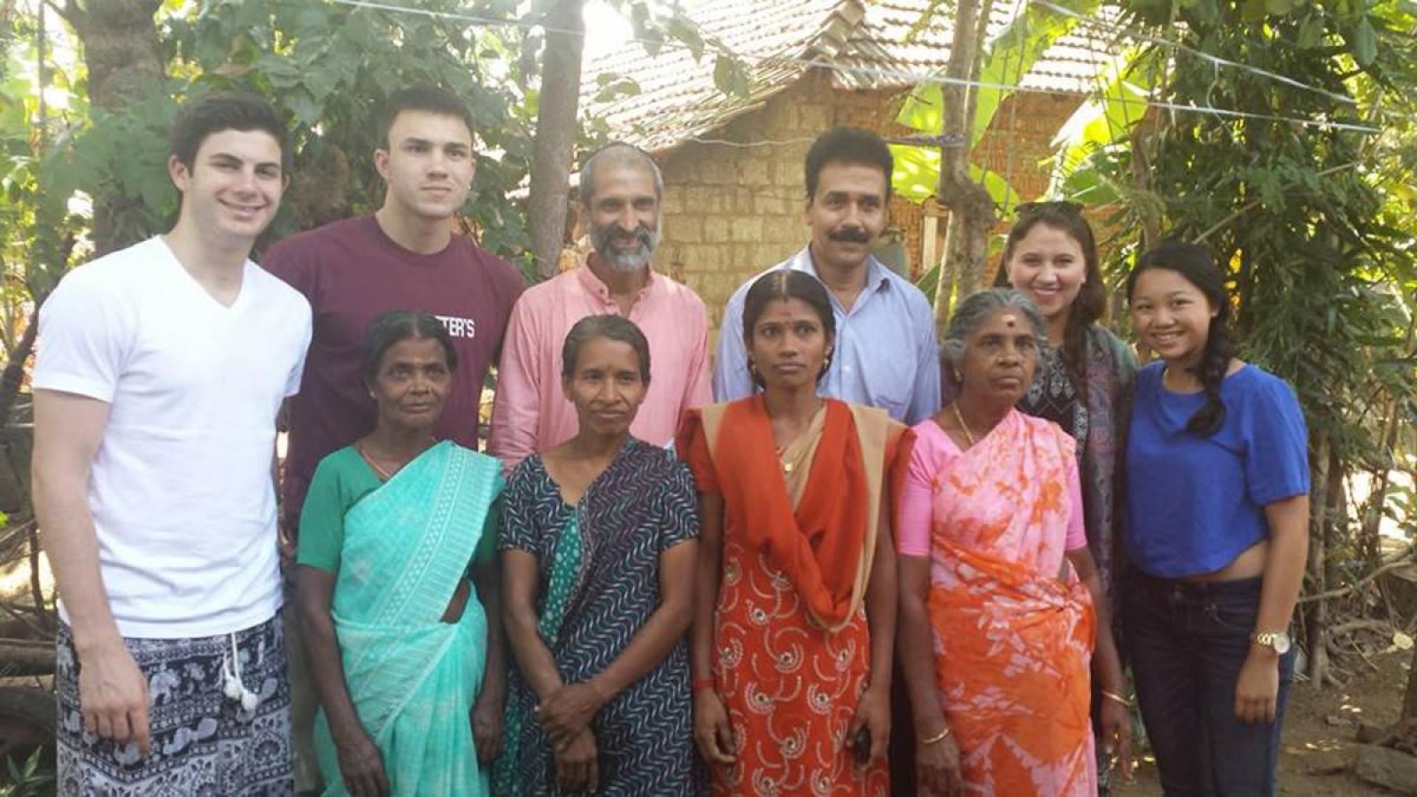 group of Lubin students with Professor Viswanath and local residents during a 2016 international field study to India