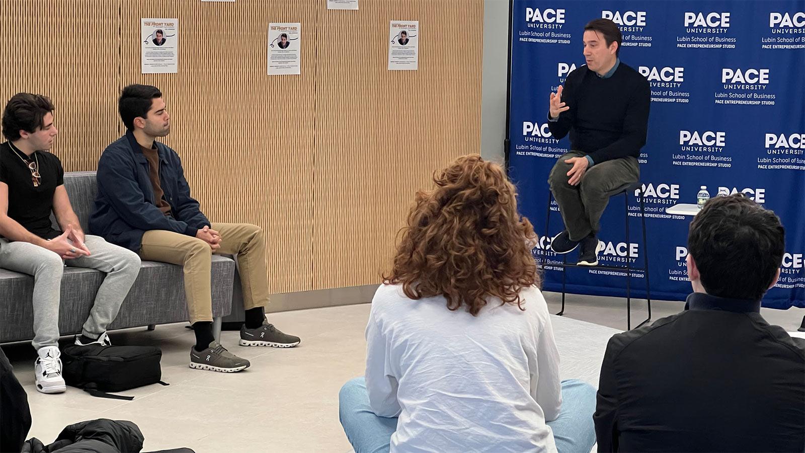 male guest speaker talking to students in the Pace Entrepreneurship Studio on the New York City Campus