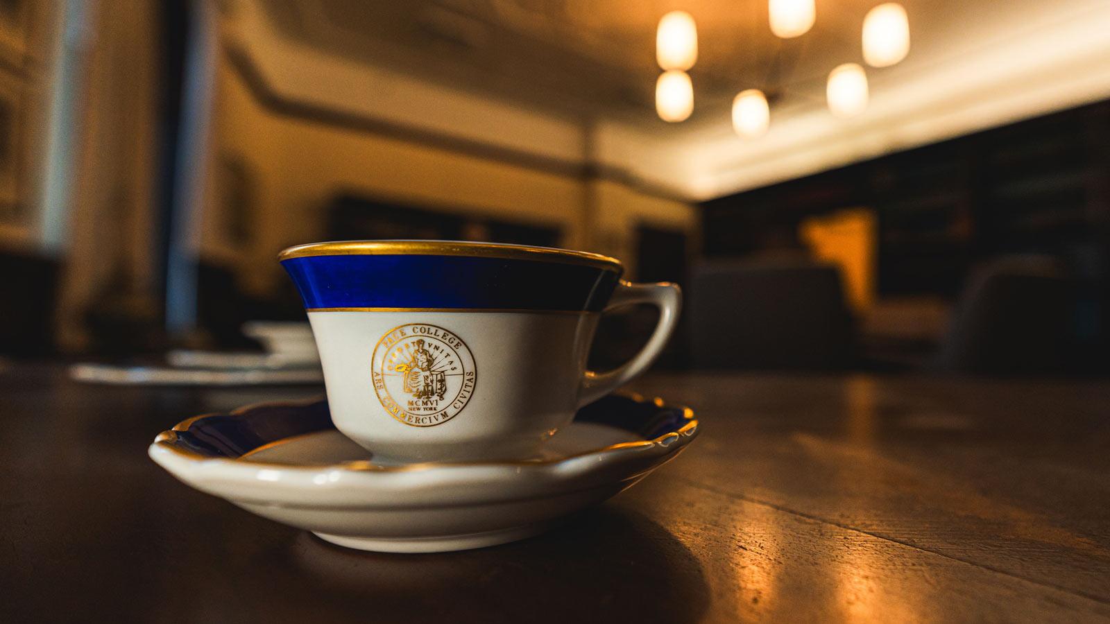 close up of a teacup and saucer with the Pace seal. 