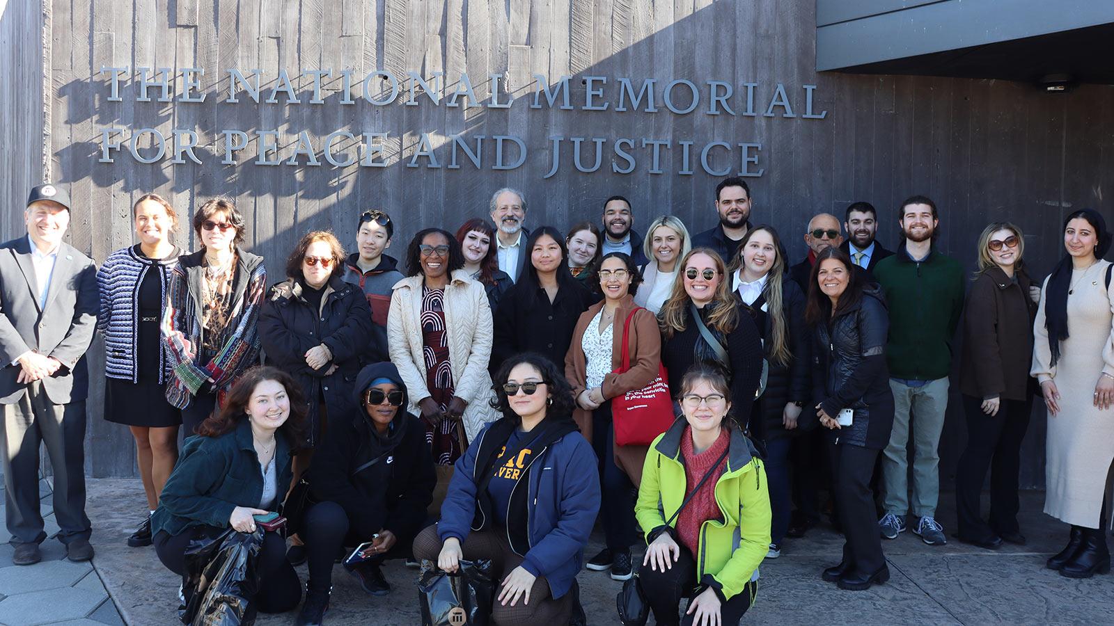 Pace President Marvin Krislov along with students and faculty at the National Memorial for Peace and Justice