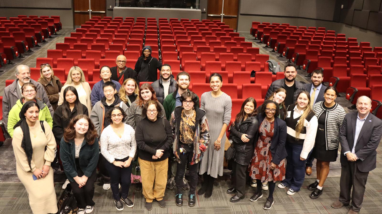 the group posing for the camera at EJI headquarters