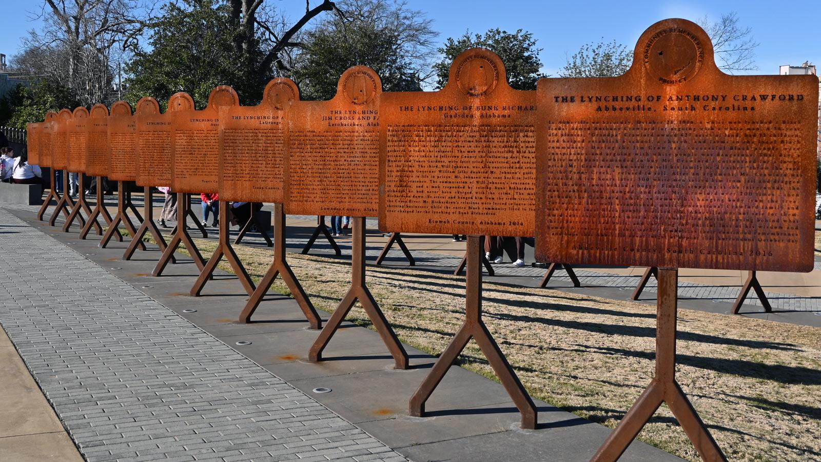 art installation of rusted plaque memorials. 